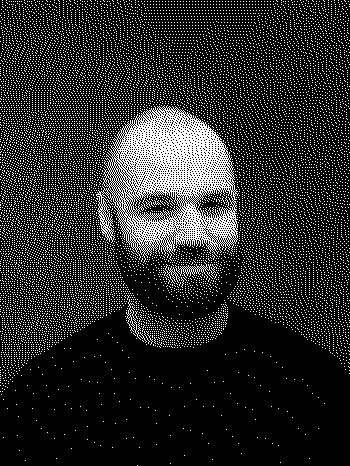 Alex's headshot, rendered in greyscale with indexed encoding.